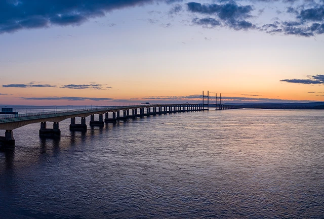 Severn Bridge crossing from England to Wales, at sunset.