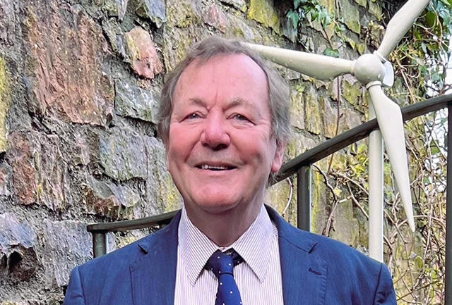 Profile headshot of Dr Andrew Garrad CBE