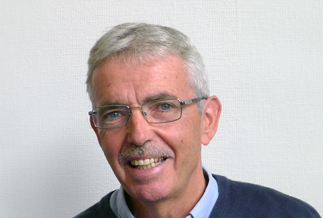 Profile headshot of Peter Davies CBE